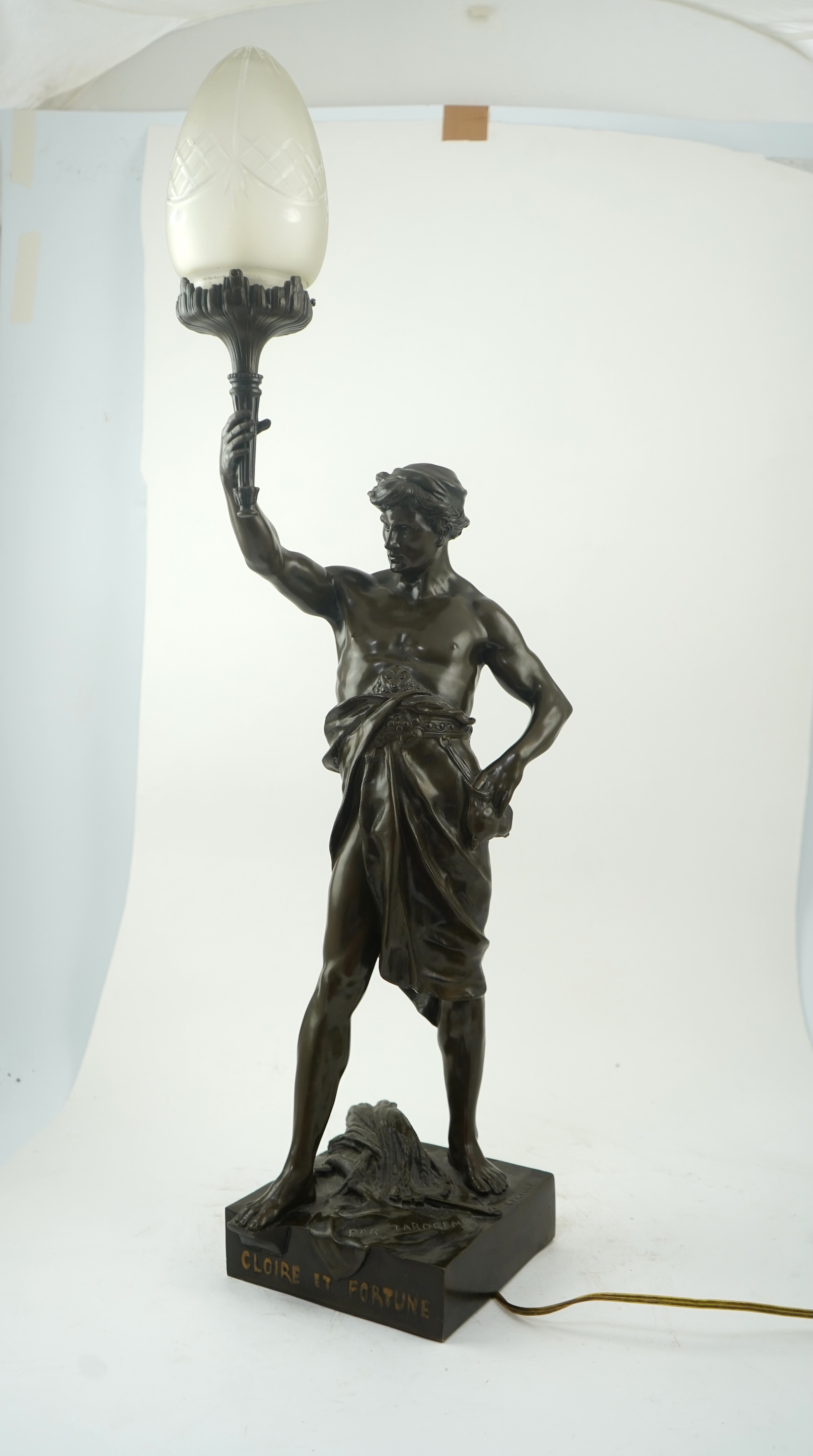 After Émile Louis Picault, a large bronze figural lamp